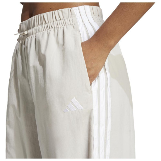 Adidas Γυναικείο παντελόνι φόρμας Sportswear Essentials 3-Stripes Woven Pants